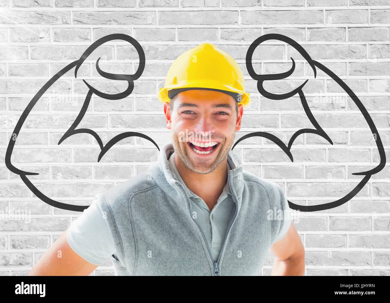 Felice lavoratore con il cappello di fronte a suon di pugni disegnare sul muro in mattoni Foto Stock