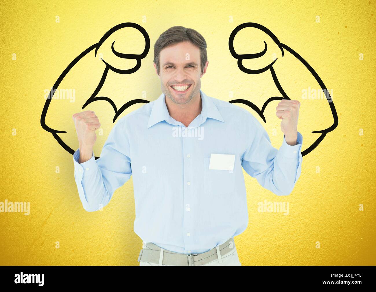 Happy businessman in alto le mani di fronte a suon di pugni disegnare sulla parete gialla Foto Stock