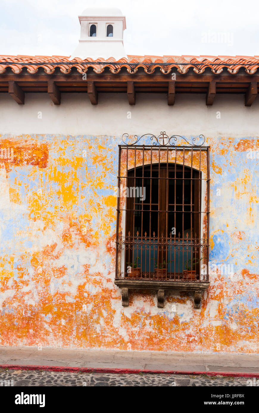 Gli edifici coloniali e le strade di ciottoli in Antigua, Guatemala, America Centrale Foto Stock