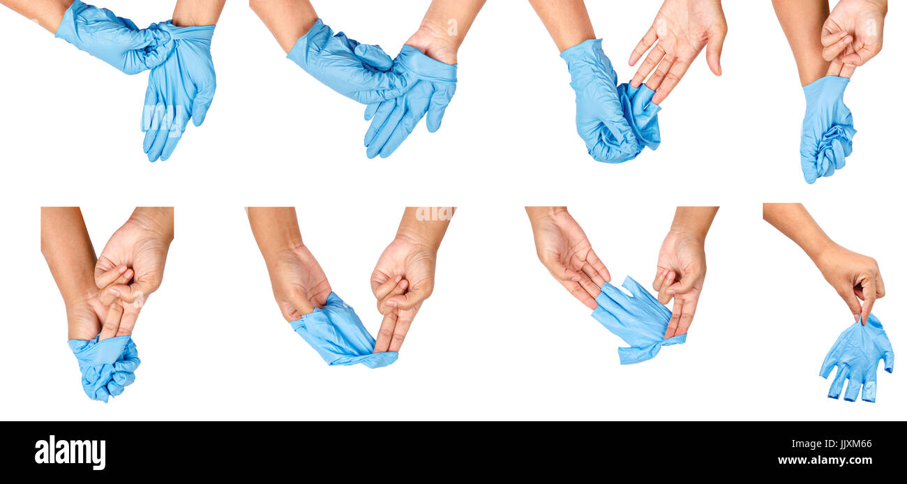 Passaggio di mano a buttare via il blu guanti monouso medicali, isolati su sfondo bianco. Controllo delle infezioni del concetto. Foto Stock
