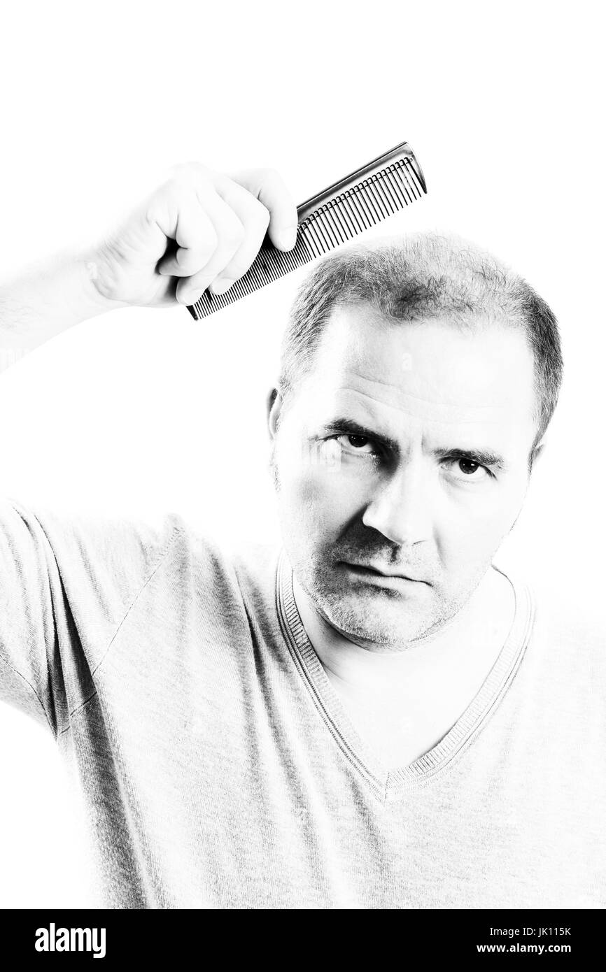 Uomo di mezza età interessate dalla perdita di capelli bald calvizie alopecia in bianco e nero Foto Stock
