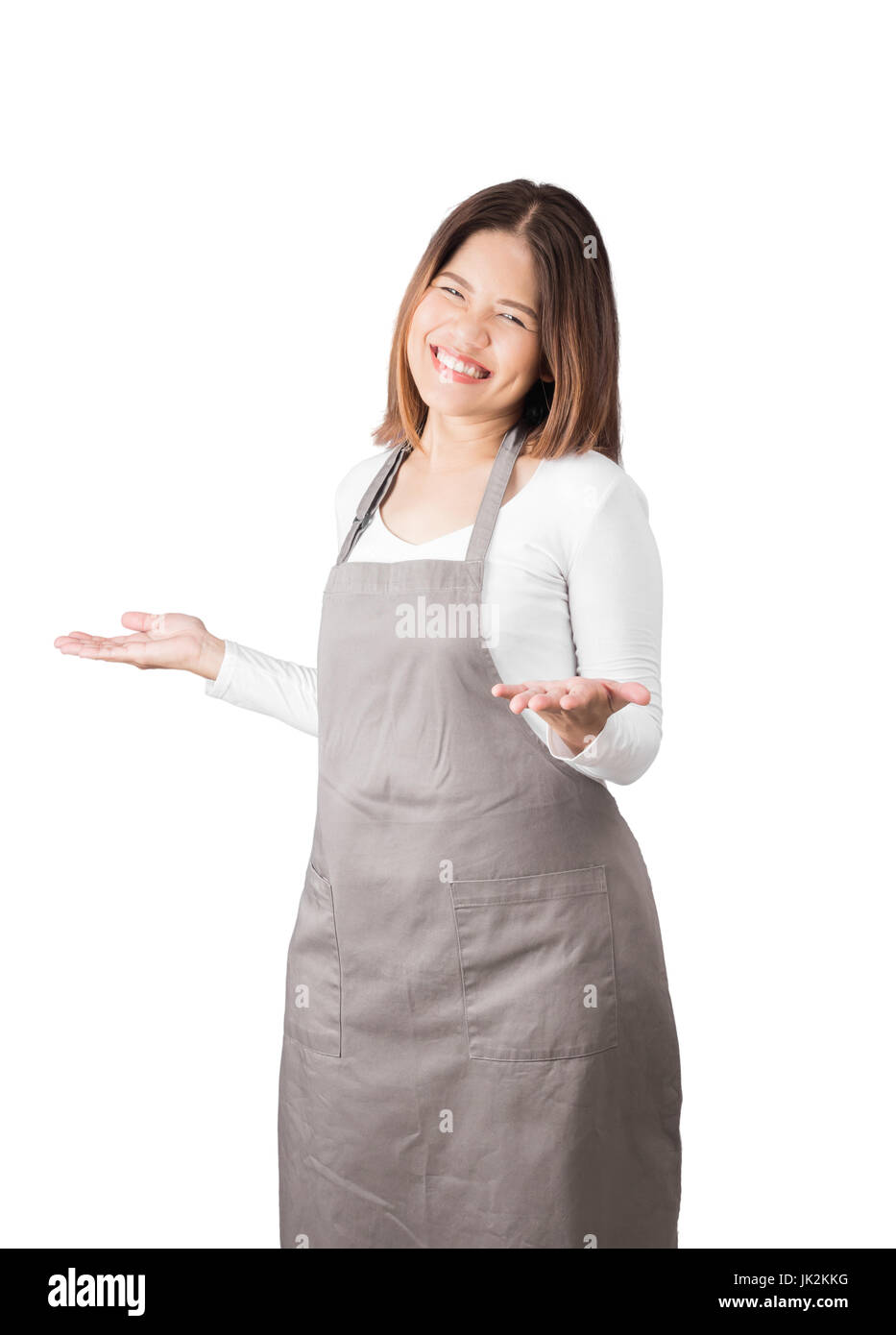 Asian Lavoratore che indossa il grembiule mani aperte isolato su bianco Foto Stock