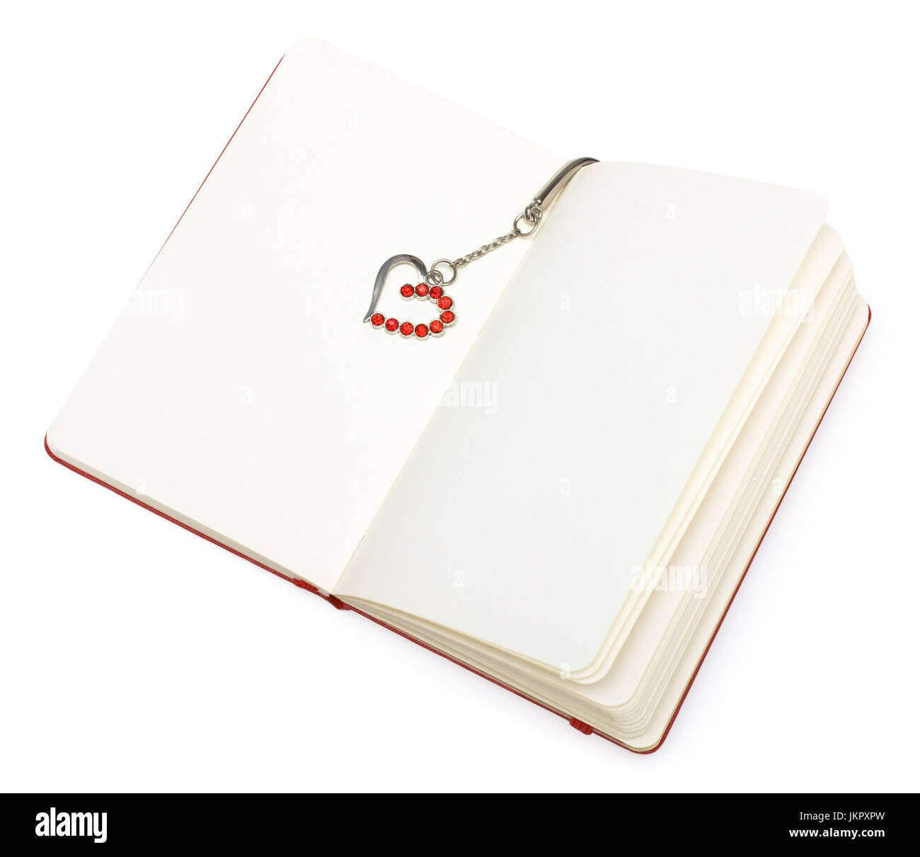 Red aprire il Blocco note (carta) con segnalibro cuore (cristalli) isolato su sfondo bianco. Foto Stock