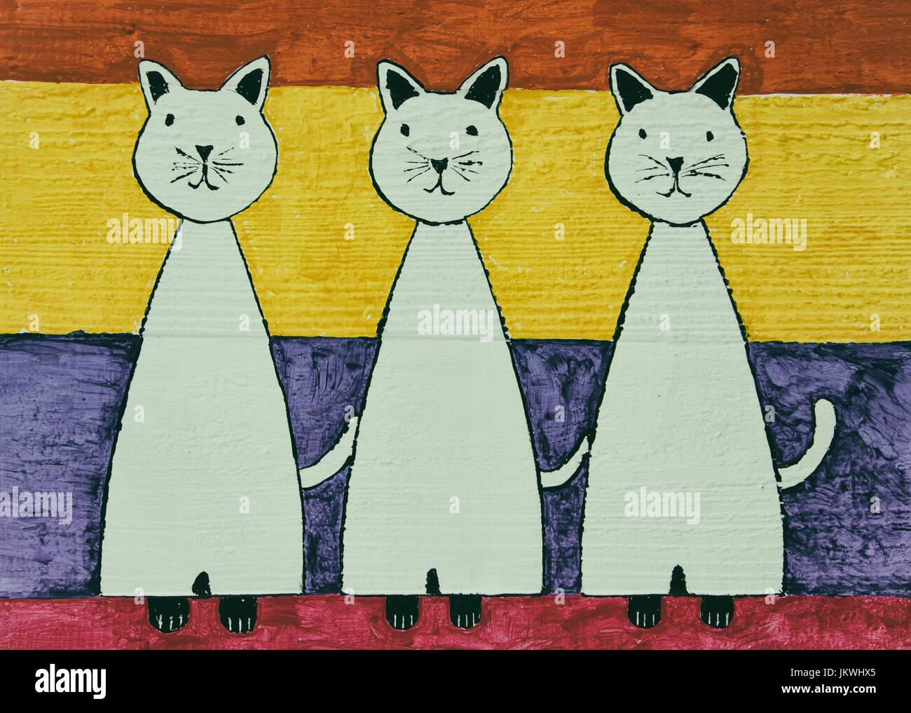 Dipinto a mano i gatti a strisce su uno sfondo di legno Foto Stock