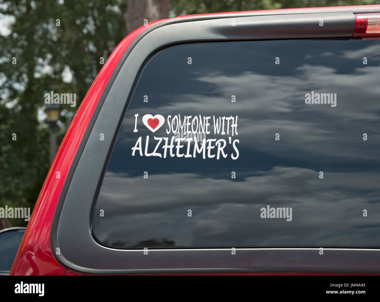 Il morbo di Alzheimer adesivo in vetro posteriore del carrello di prelievo. Foto Stock