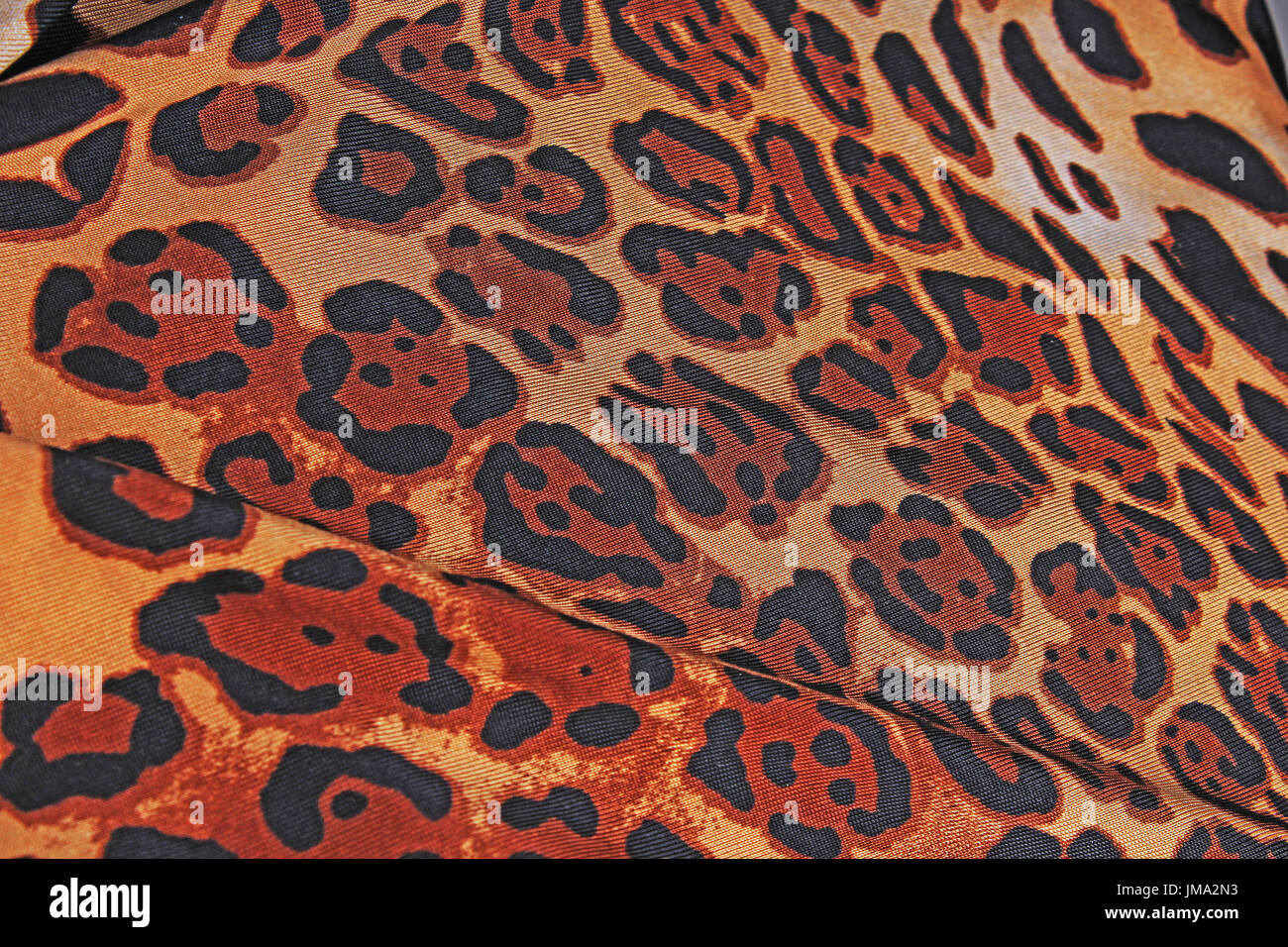 Tessuto, tela design sfondo dello sfondo. Tessuti moda come sfondo. Vestiti pattern texture closeup photo. Foto Stock