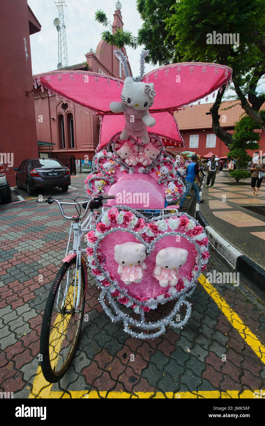 Trishaws colorati in Olandese Square, Malacca, Malaysia Foto Stock