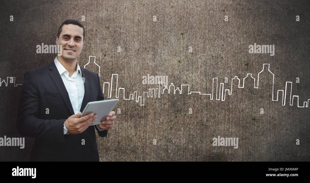 Digital composito di Happy business man tenendo una pastiglia contro il muro grigio Sfondo con icone della città Foto Stock