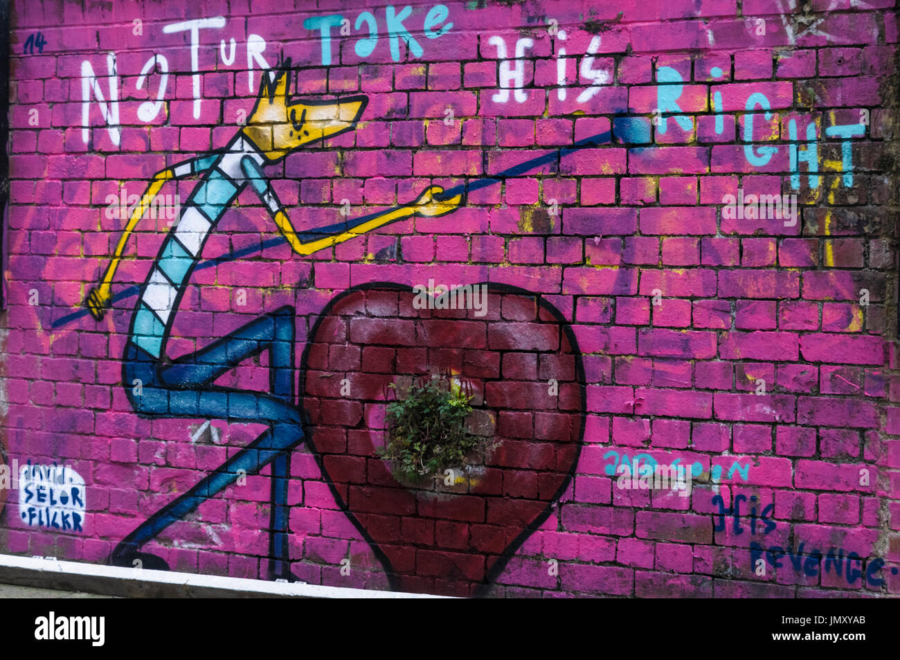 Graffiti a Brick Lane, a est di Londra. Foto Stock