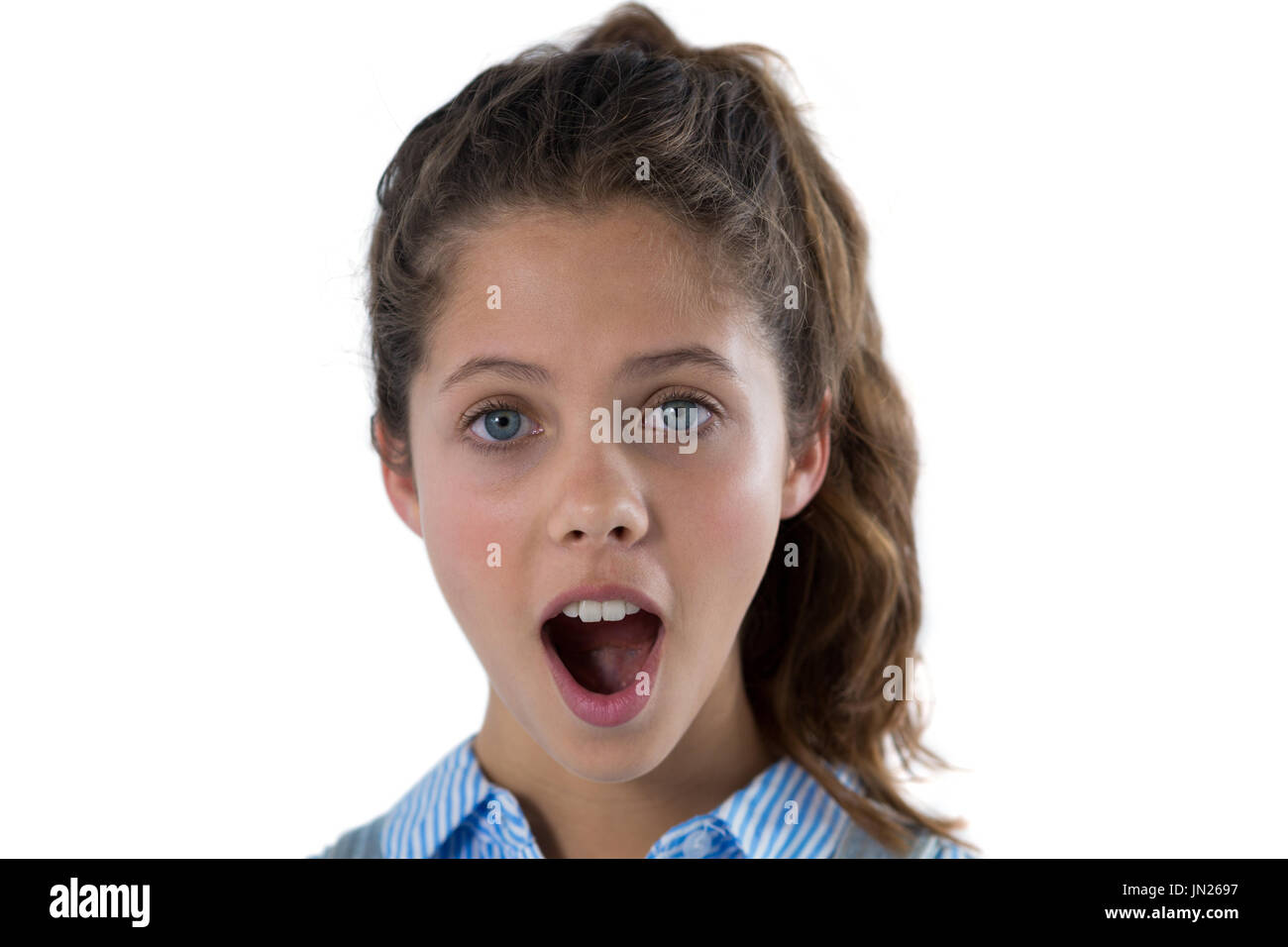 Ritratto di scioccato ragazza adolescente contro uno sfondo bianco Foto Stock