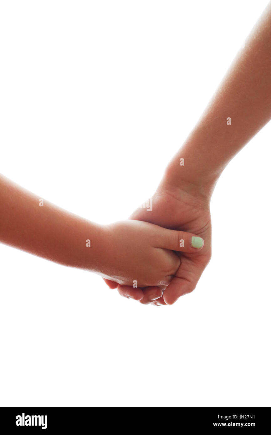 Chiudere fino a due bambini tenendo le mani contro uno sfondo bianco Foto Stock