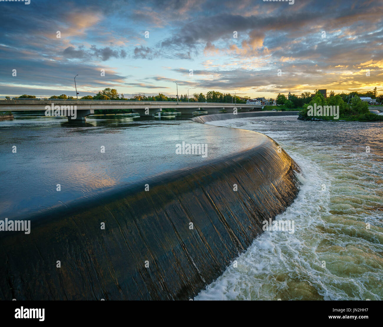 Weir al tramonto Foto Stock