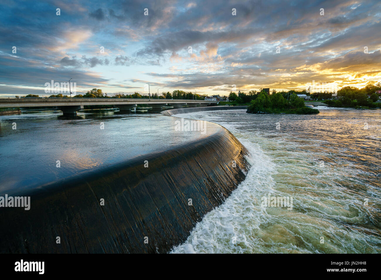 Weir al tramonto Foto Stock