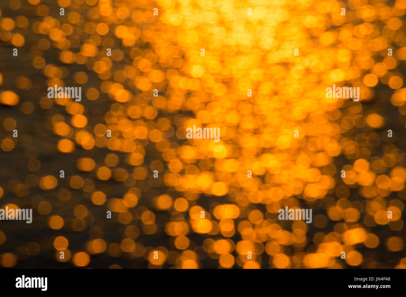 Riflesso caldo Bokeh luce spenta Oceano Atlantico Foto Stock