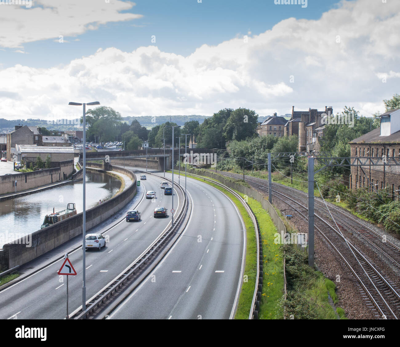 Su strada, per ferrovia e canal Foto Stock