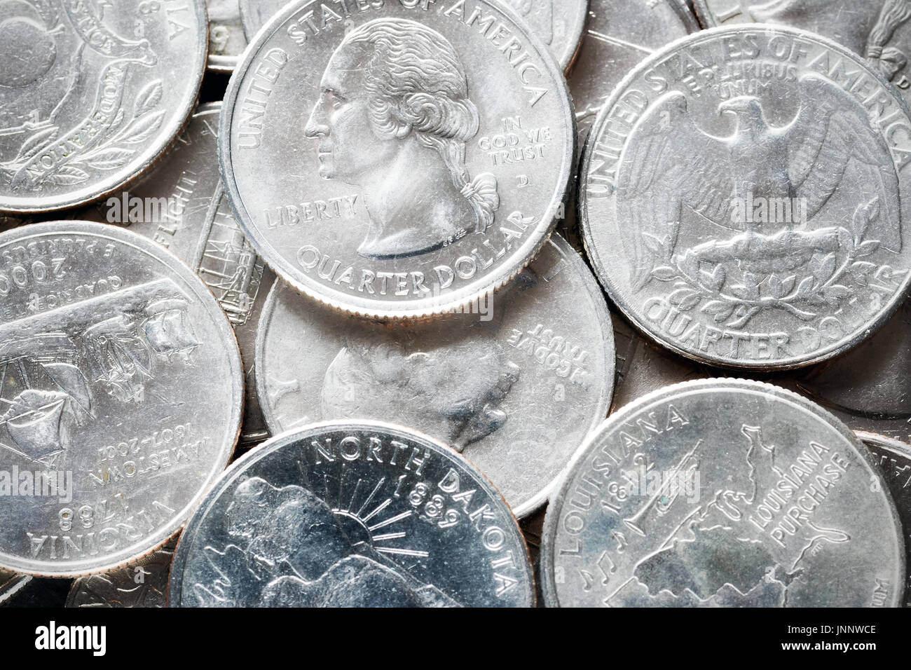 Extreme close up foto di Stati Uniti quarto di dollaro monete, profondità di campo. Foto Stock