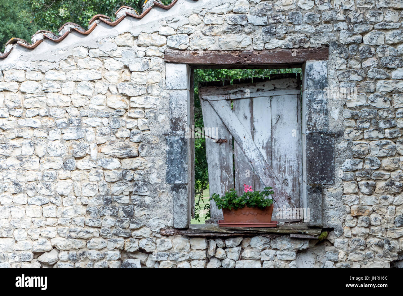 Rurale fascino francese sul lato di un edificio Foto Stock