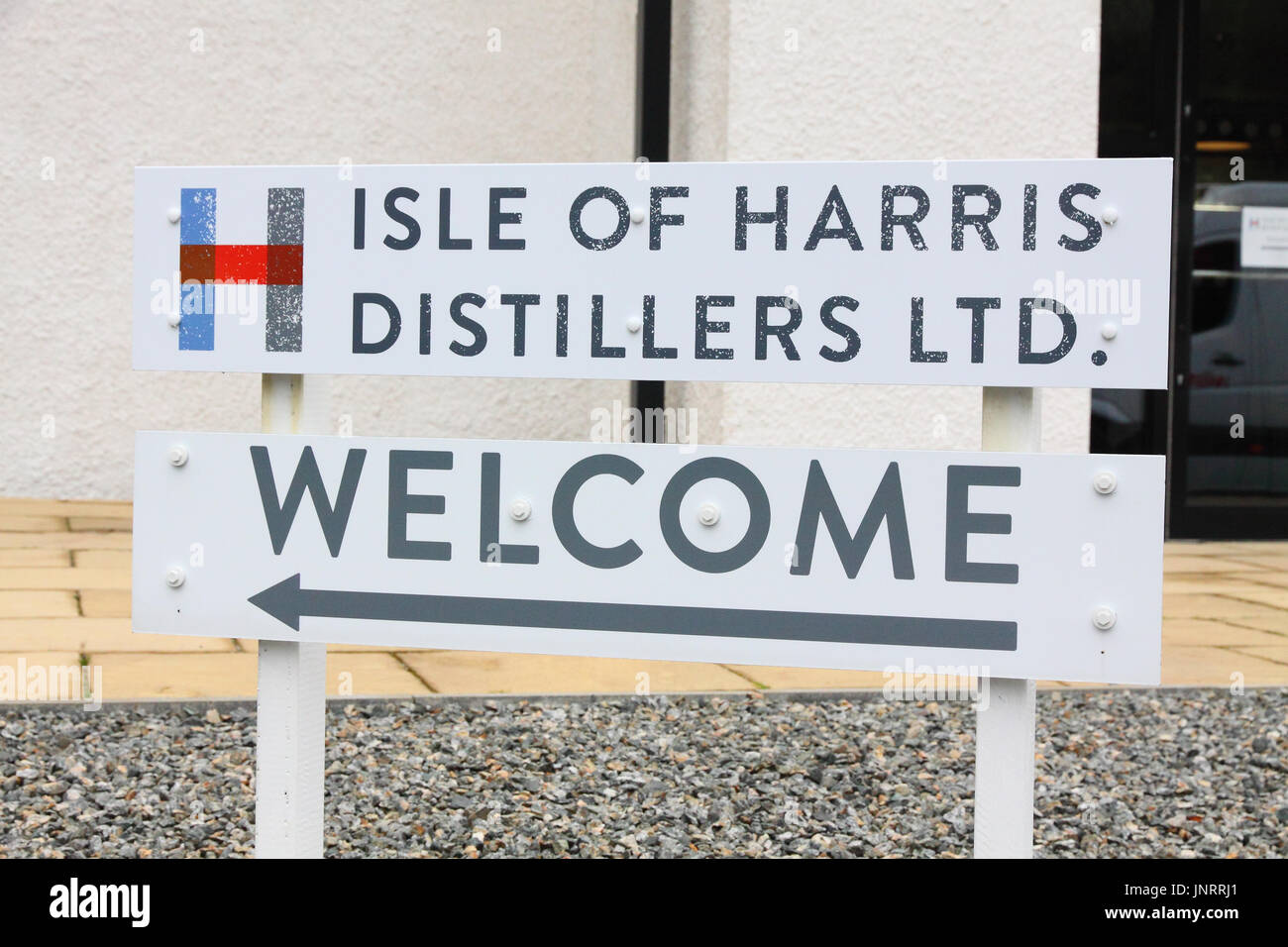 Isle of Harris i distillatori segno a Tarbert, Harris Foto Stock