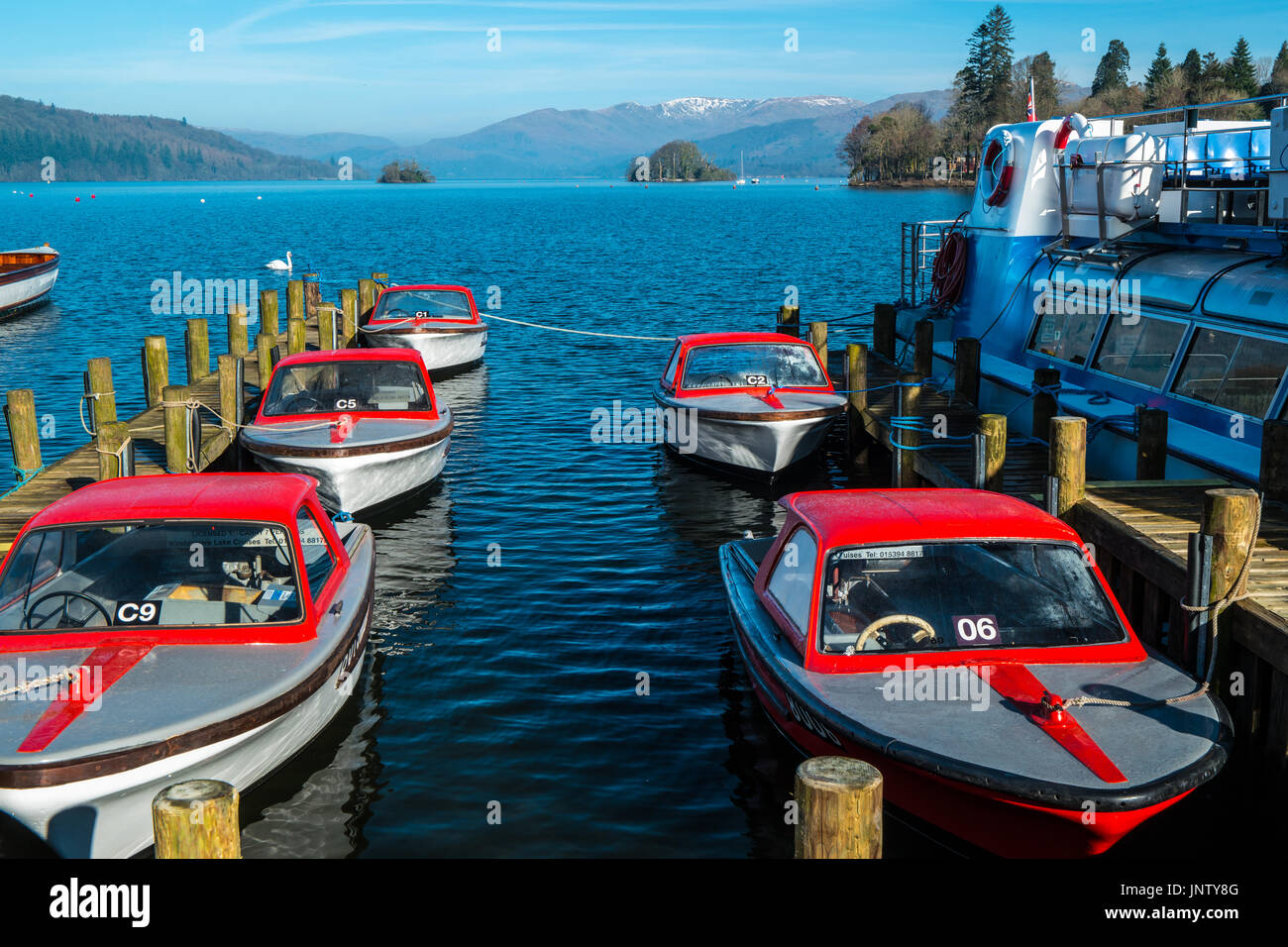 Barche sul Lago di Windermere Foto Stock