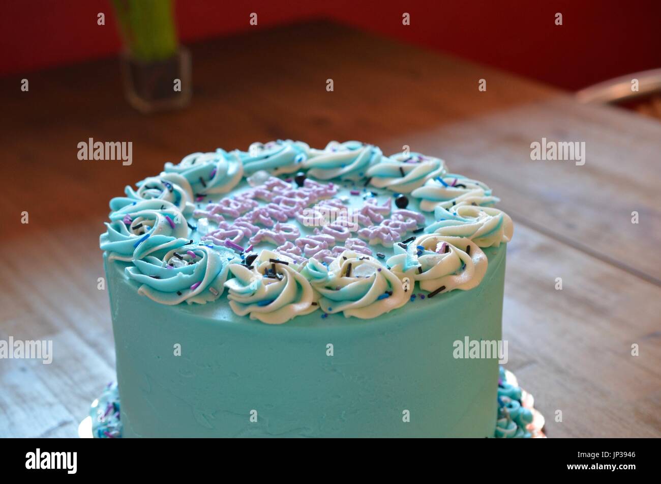 UNC torta di compleanno sul piano portapaziente in legno Foto Stock