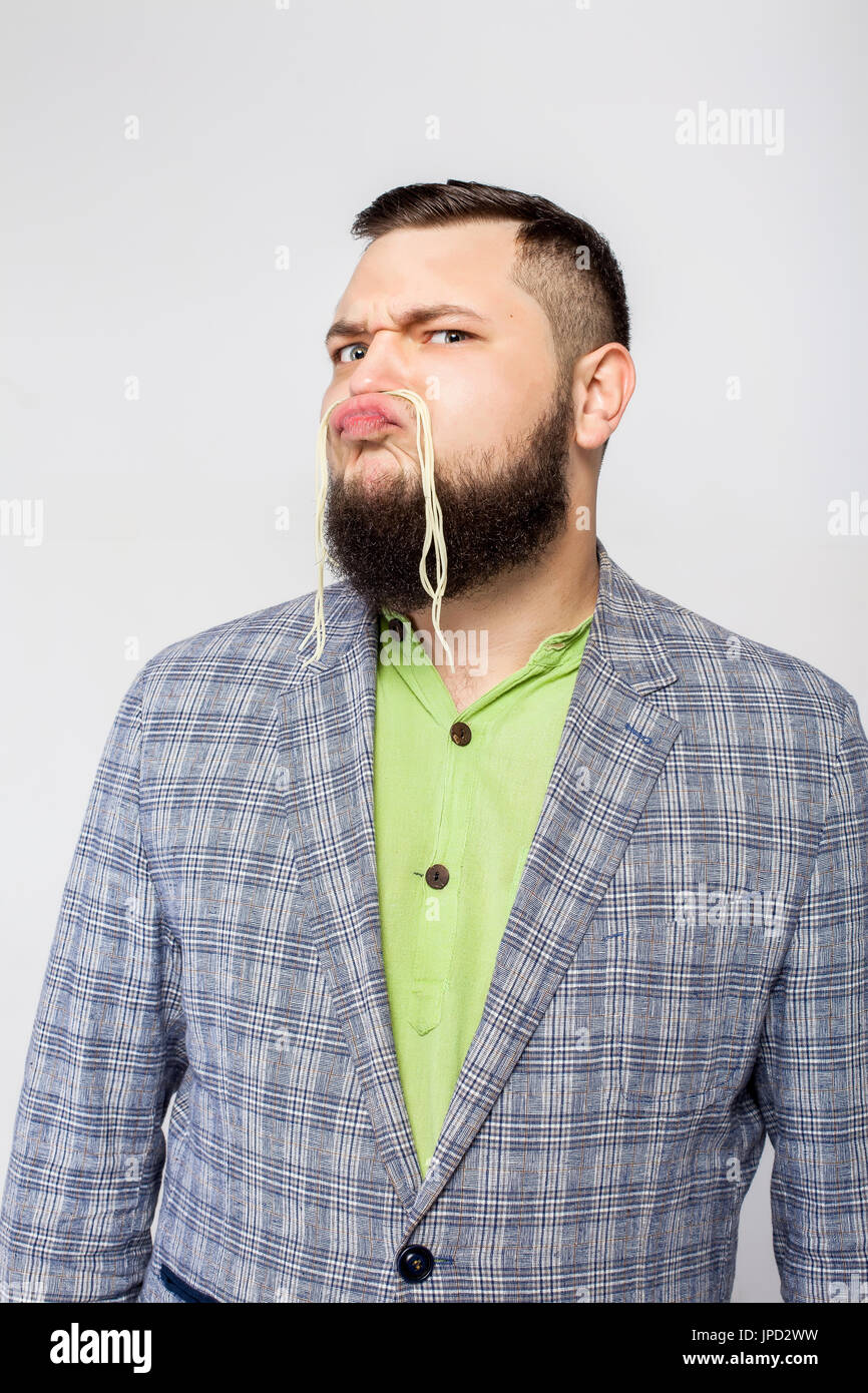 Grasso uomo serio con la barba Foto Stock