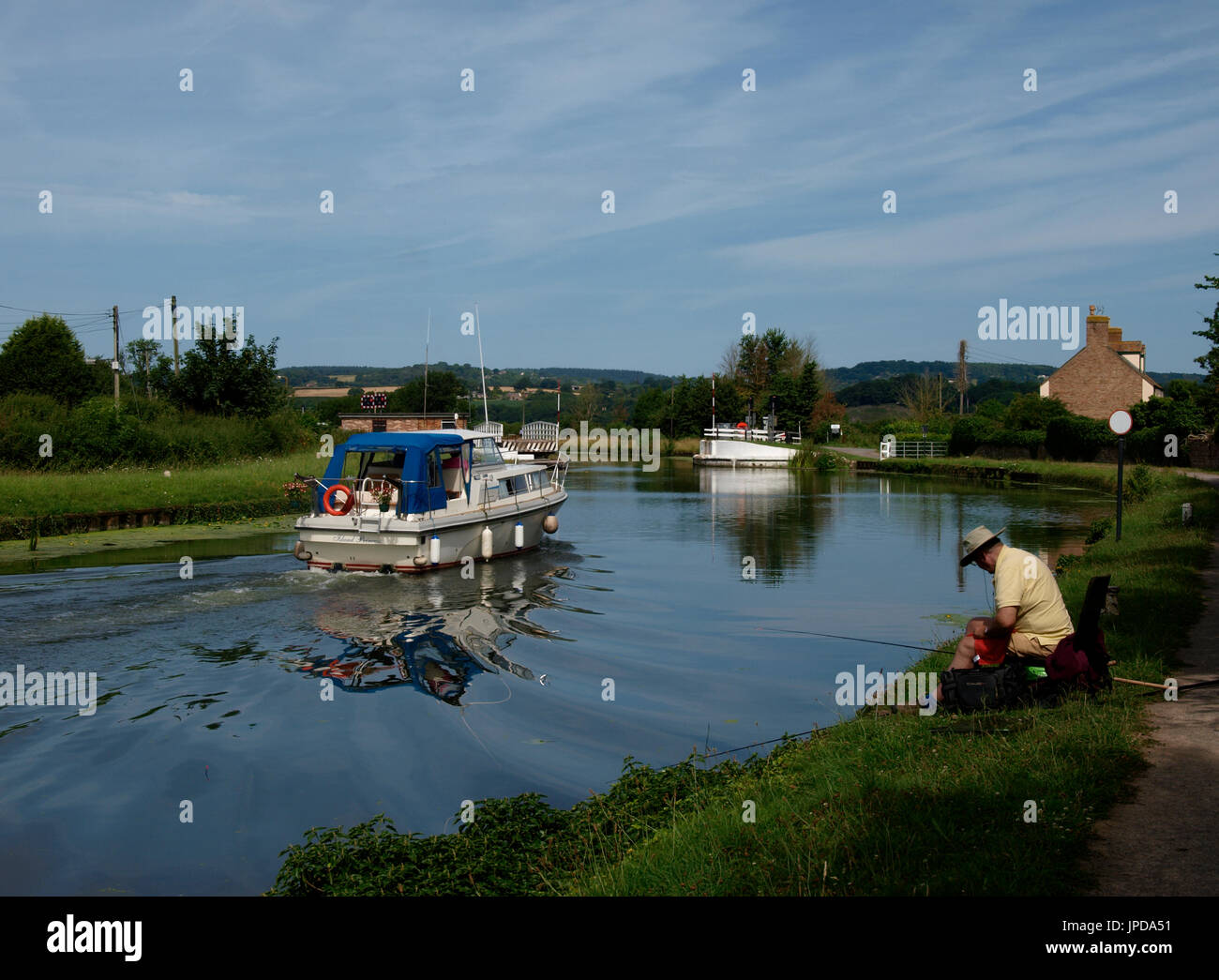 L'uomo la pesca di Gloucester e Nitidezza Canal. Foto Stock