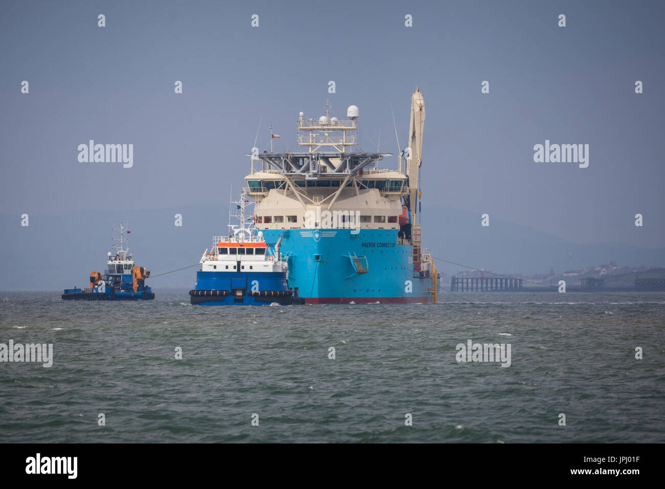 Il cavo laici, nave Maersk connettore, installando il Walney 3 cavo di esportazione. La fattoria eolica diventerà parte del del parco eolico offshore più grande del mondo e si trova al largo della costa della Cumbria, Regno Unito Foto Stock