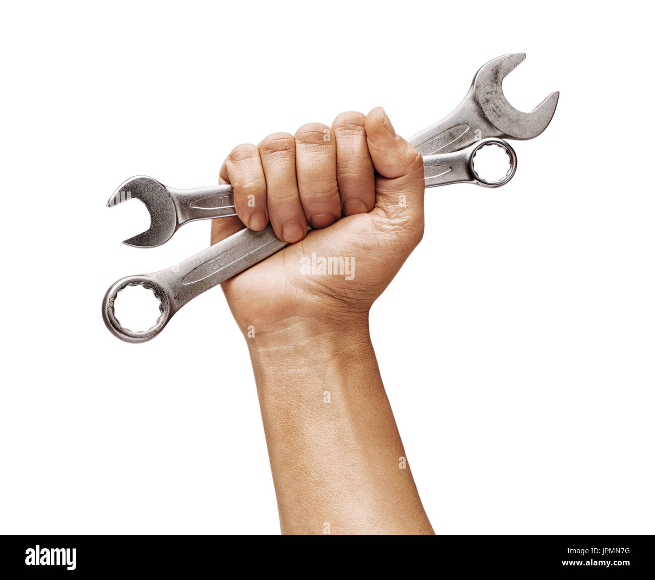 Mano d'uomo detiene un chiavi isolati su sfondo bianco. Close up. Alta risoluzione prodotto Foto Stock