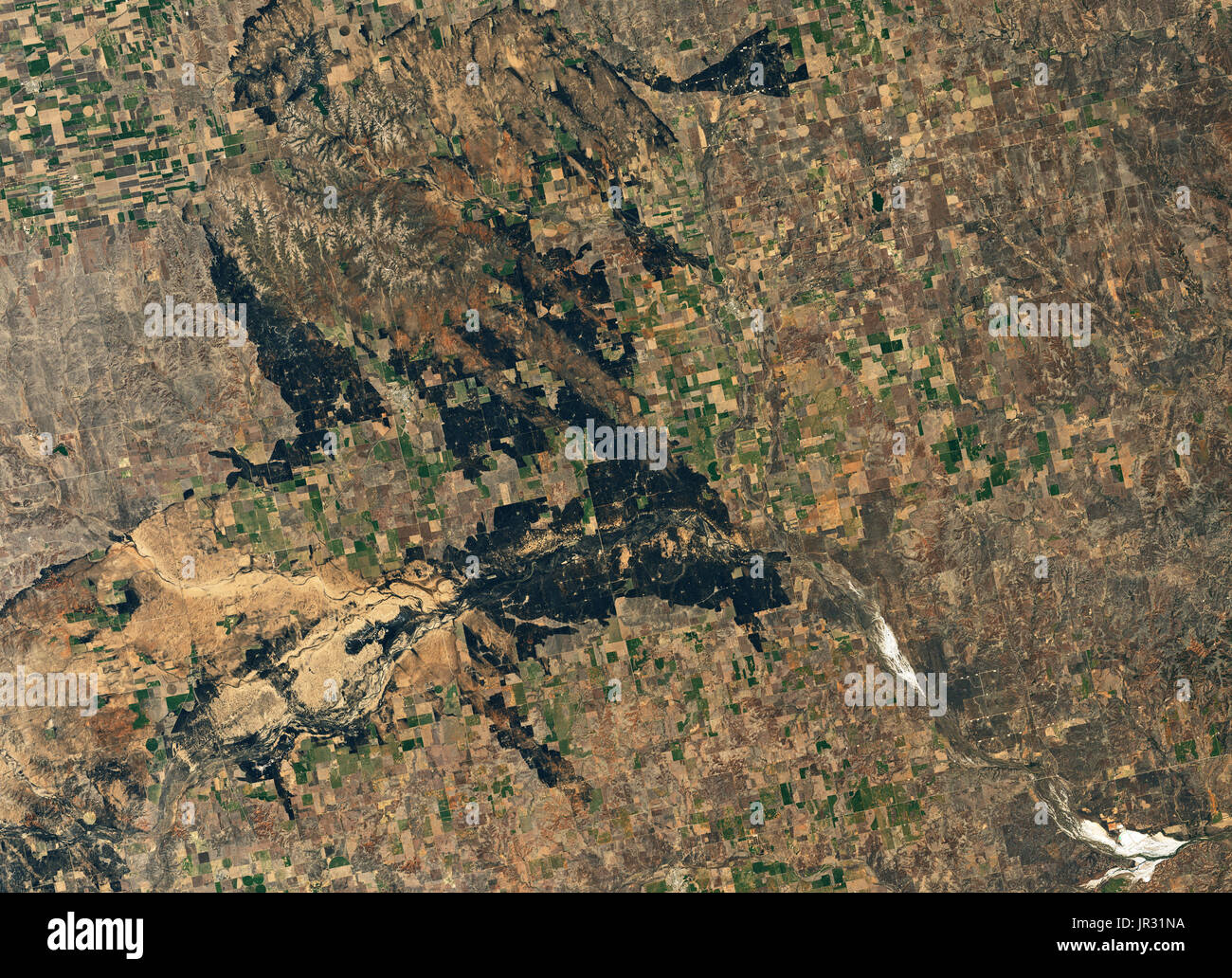 La zona intorno a Ashland, Kansas, bruciato dal fuoco Starbuck in marzo, 2017. Fotografia scattata da terra operative imager (OLI) sul satellite Landsat 8 il 17 marzo 2017. Foto Stock