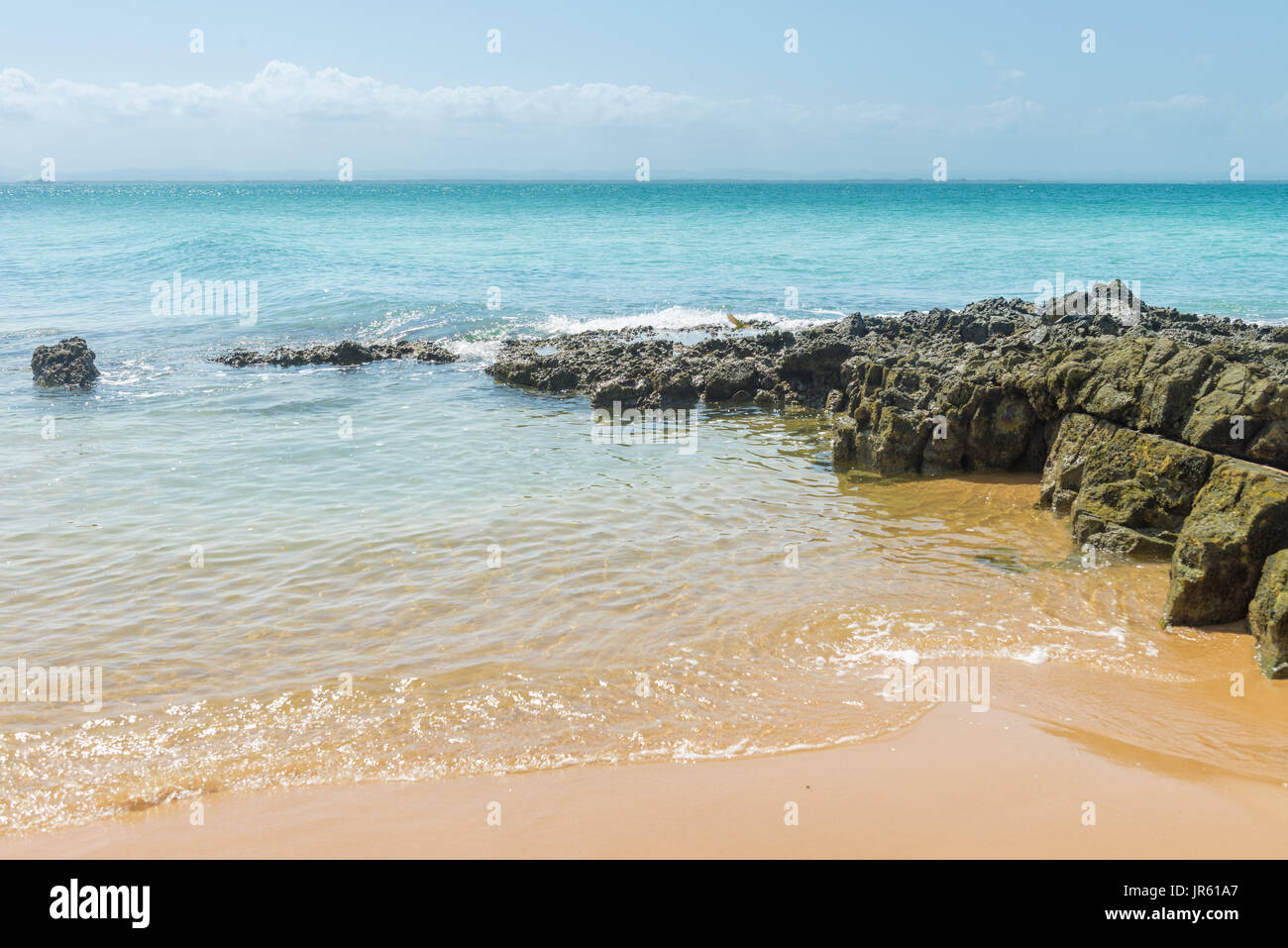 Spiaggia di texture di superficie sabbiosa con ondulazioni formate dal vento Foto Stock