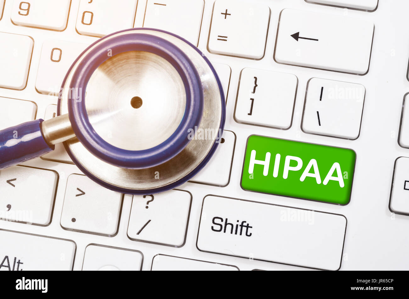 Health Insurance Portability and Accountability concetto - Stetoscopio con scritto HIPPA coumputer sulla tastiera. Foto Stock