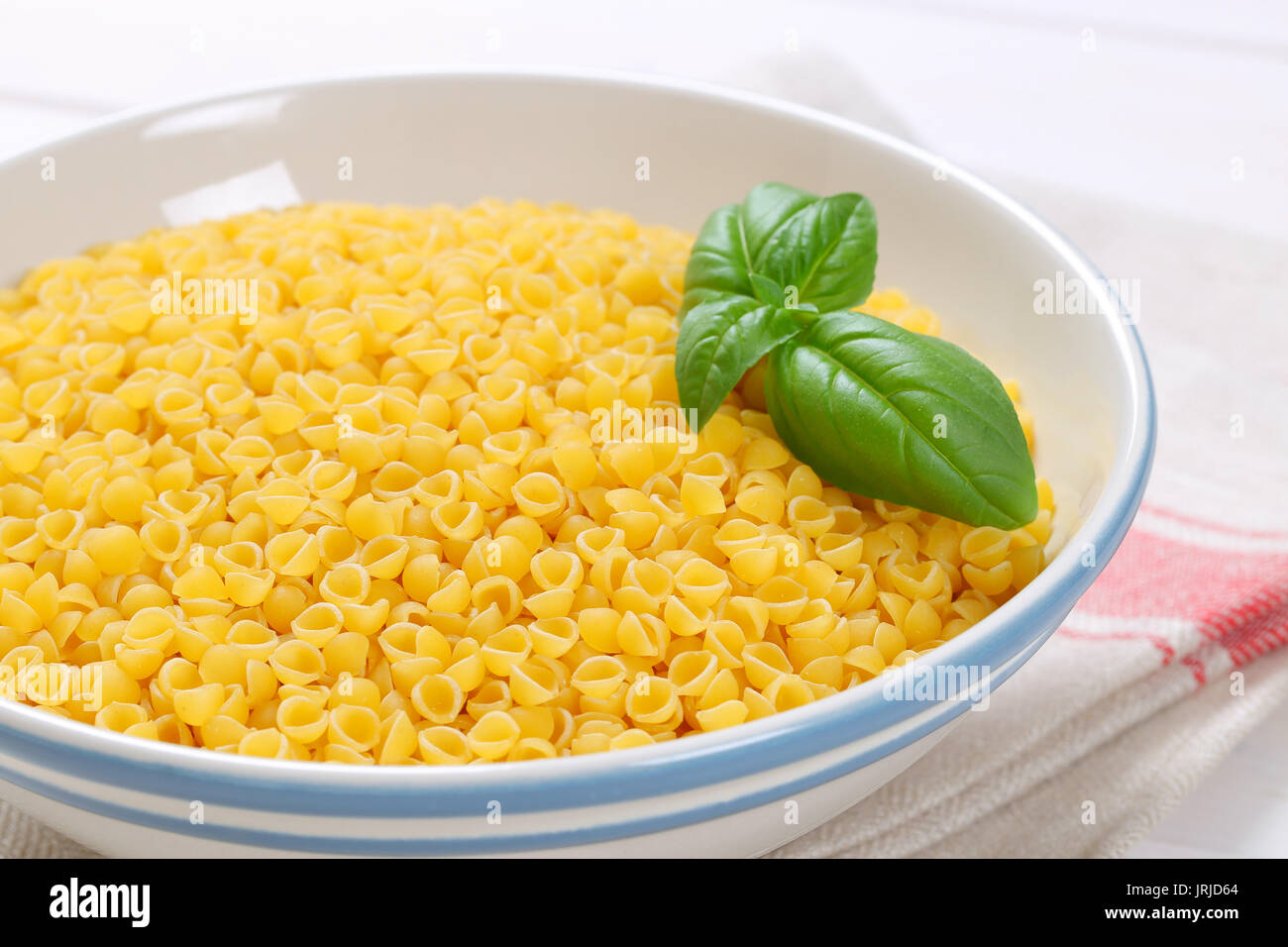 Ciotola di pastina gusci - close up Foto Stock