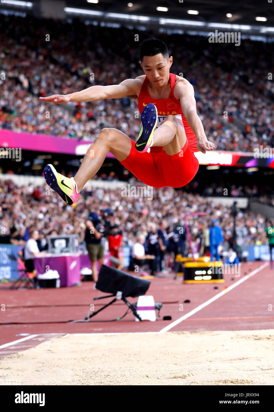 Della Cina di Jianan Wang in azione in Uomini Salto in lungo Foto Stock