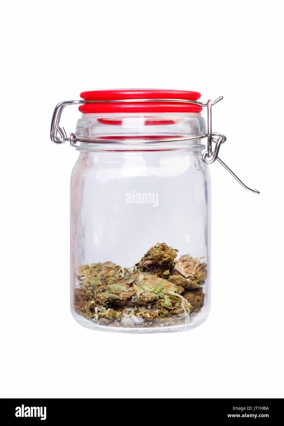 La marijuana e la cannabis, un vasetto di erbaccia su sfondo bianco Foto Stock