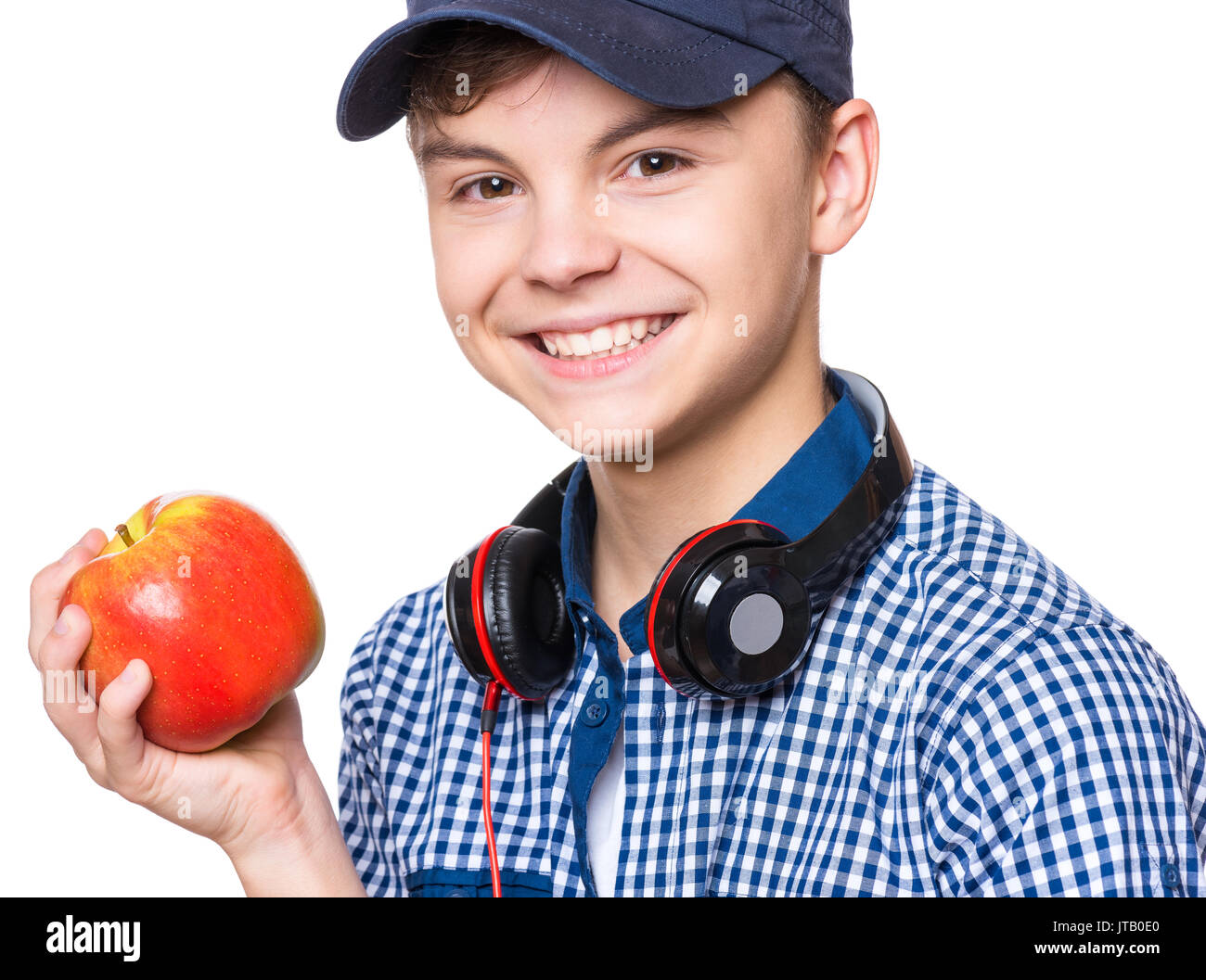 Teen boy con il cappuccio e le cuffie Foto Stock