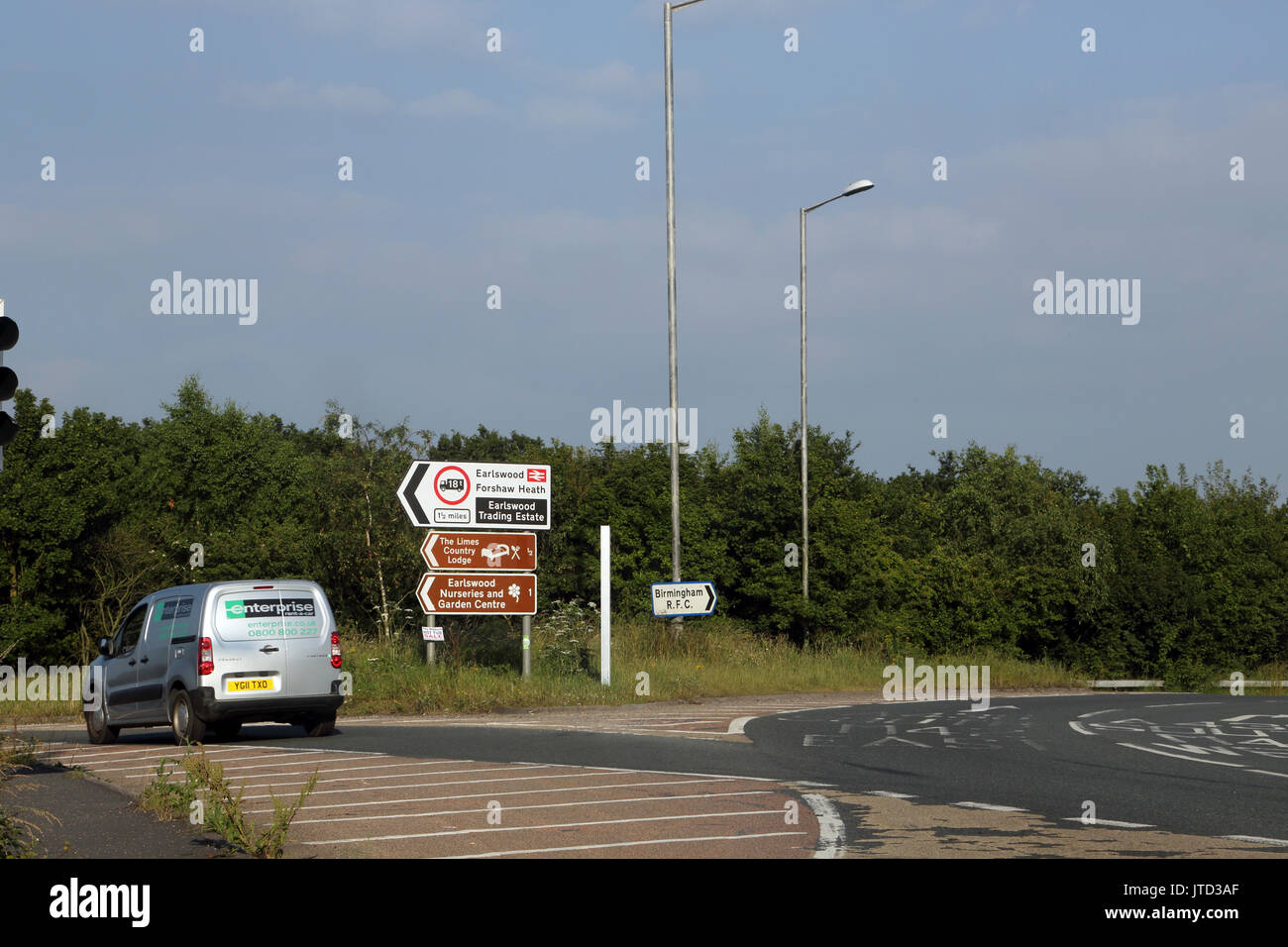 Enterprise noleggio auto in autostrada in direzione Earlwood Forshaw Heath Trading Station Wagon Inghilterra Foto Stock