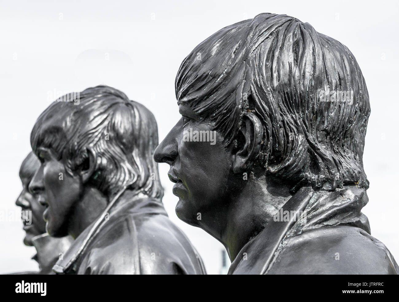 I Beatles sculture su Liverpool anteriore d'acqua. Foto Stock