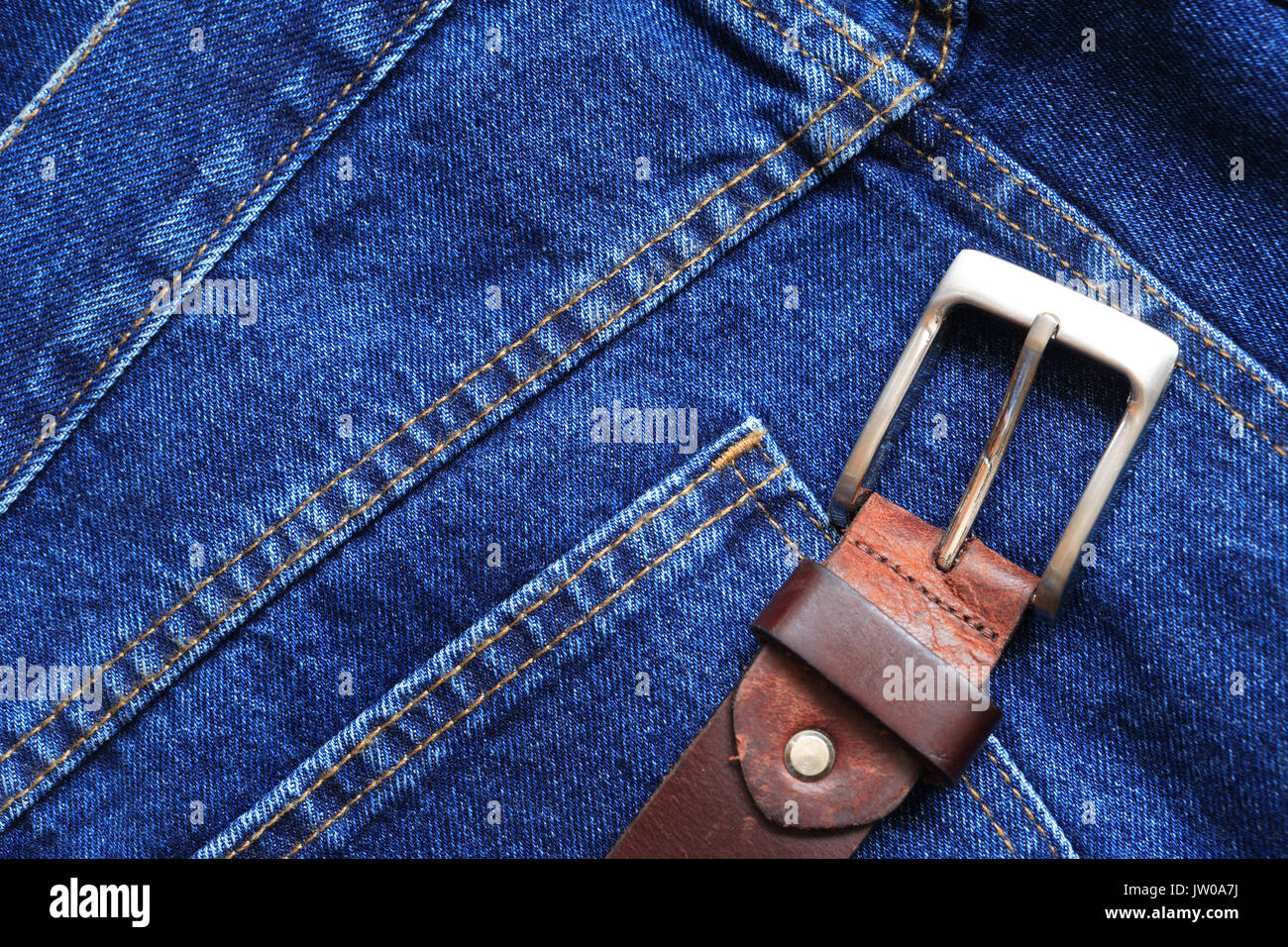 Bello sfondo costituito da estrema closeup jeans blu con la cinghia Foto Stock