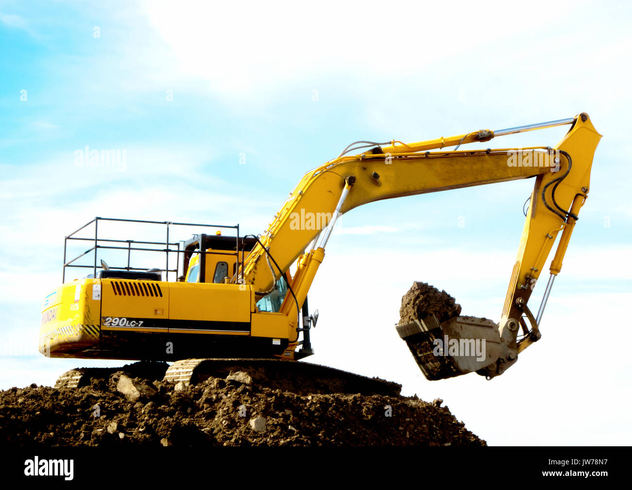 Caricatore a estremità anteriore la movimentazione del suolo Foto Stock