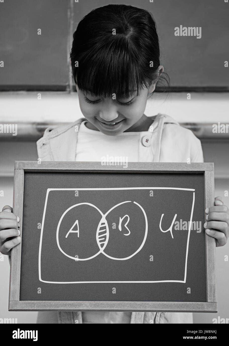 Digital composito della ragazza con la lavagna con gli schemi del grafico Foto Stock