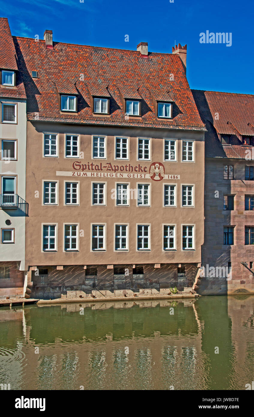 Zum Heiligen Geist edificio, sul fiume Pegnitz, Nernberg, (Norimberga,), il Land della Baviera, Europa Foto Stock
