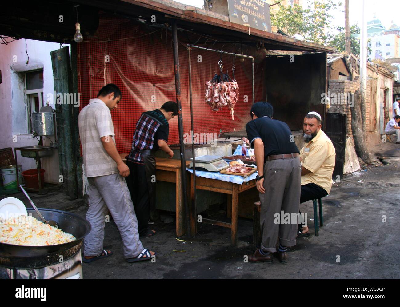 La macelleria in Urumqi mercato vecchio Foto Stock