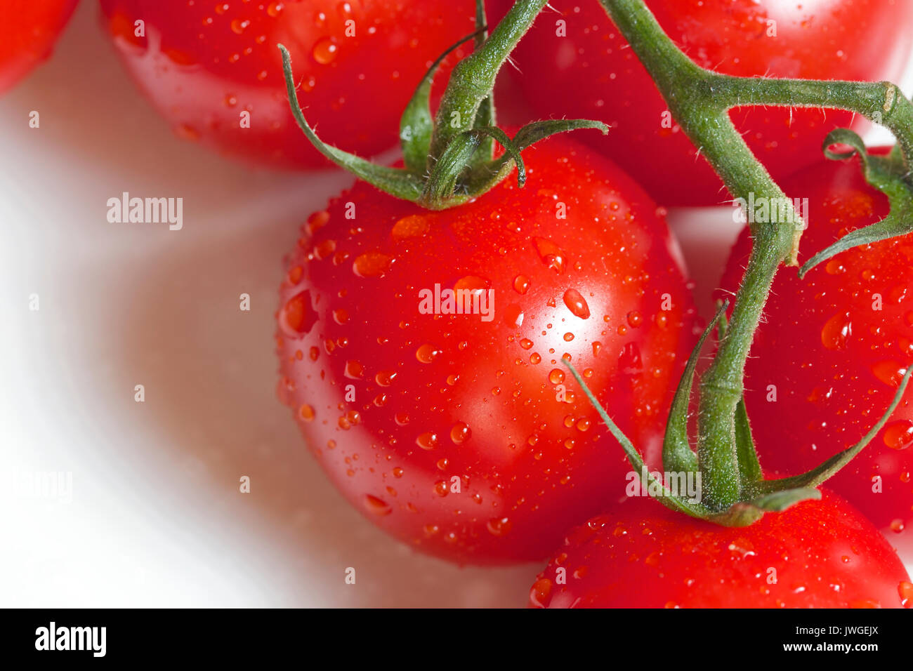 I pomodori sono una fonte eccellente di vitamina C Foto Stock