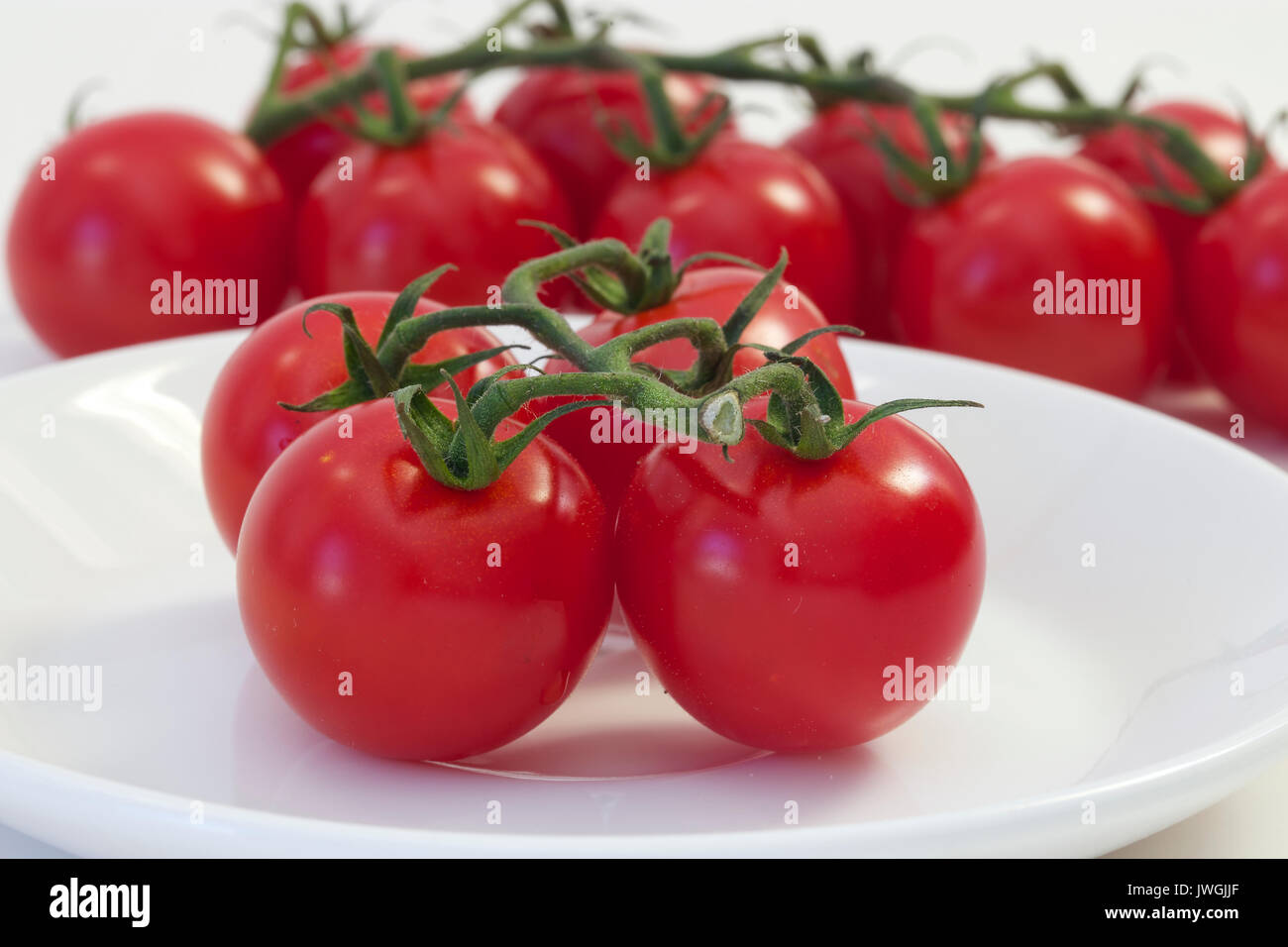 I pomodori sono una fonte eccellente di vitamina C Foto Stock