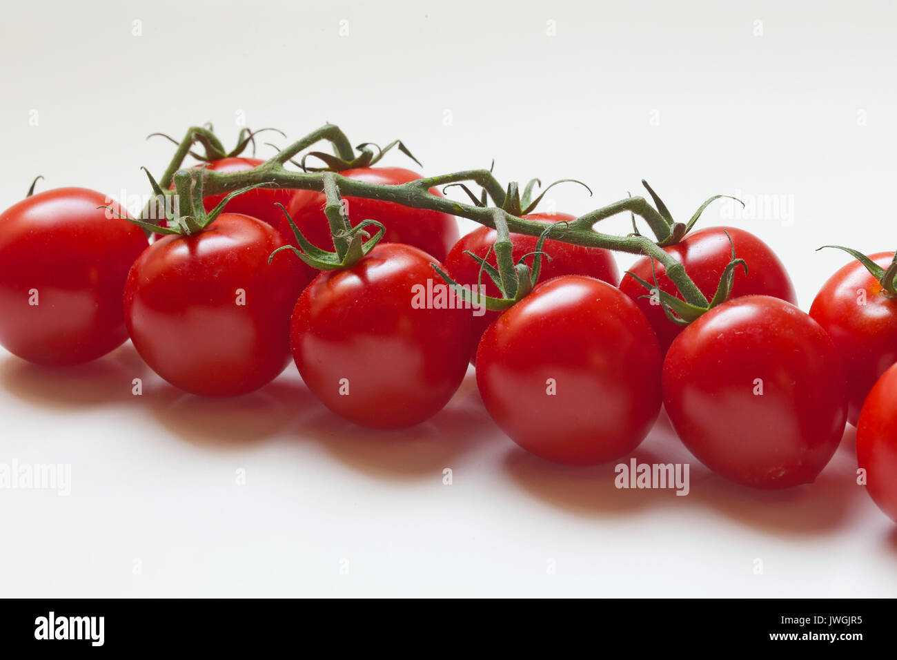 I pomodori sono una fonte eccellente di vitamina C Foto Stock