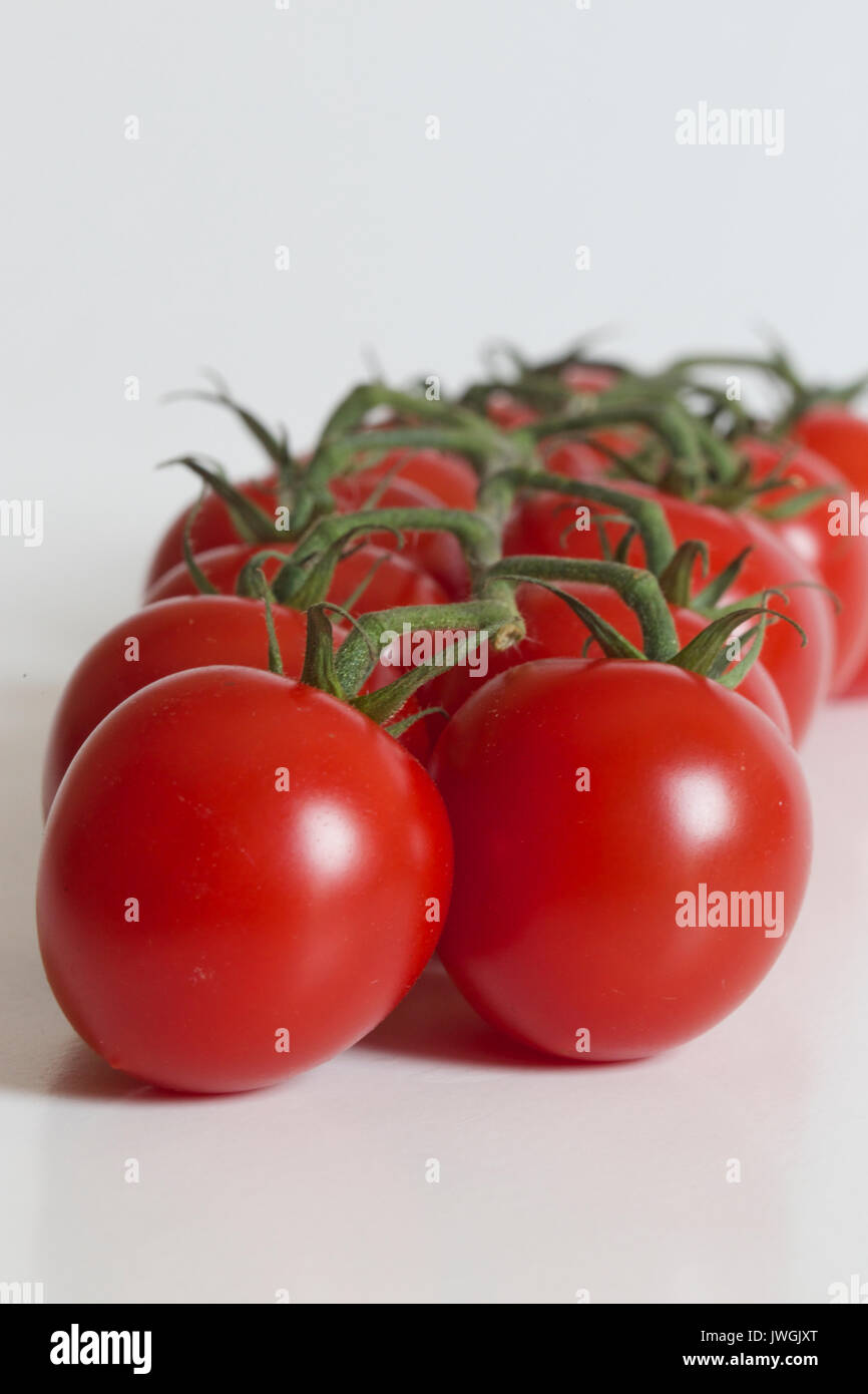 I pomodori sono una fonte eccellente di vitamina C Foto Stock