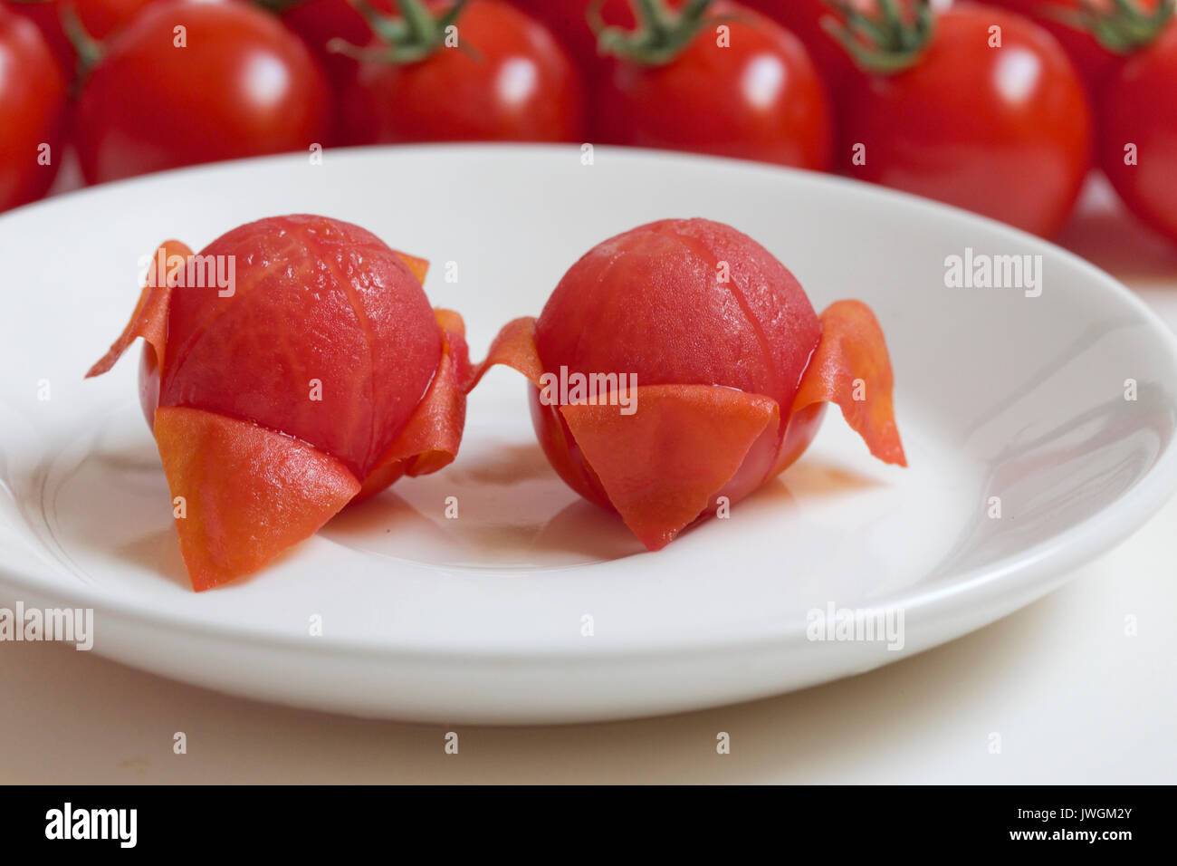 I pomodori sono una fonte eccellente di vitamina C Foto Stock