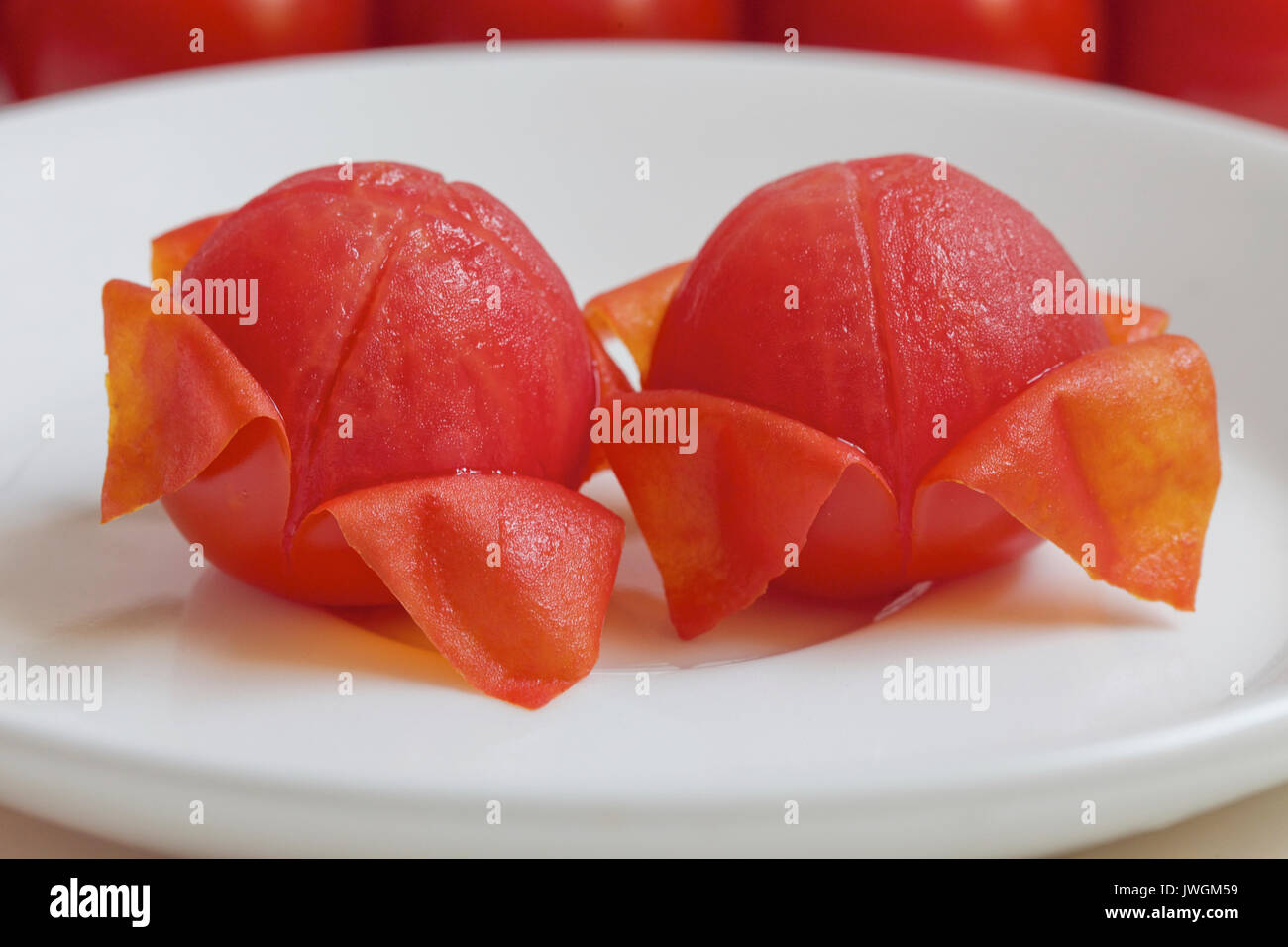 I pomodori sono una fonte eccellente di vitamina C Foto Stock