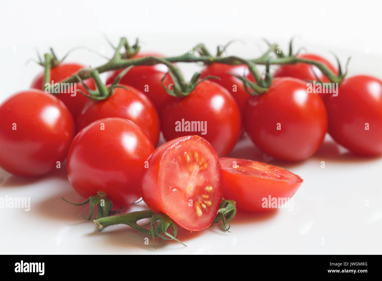 I pomodori sono una fonte eccellente di vitamina C Foto Stock