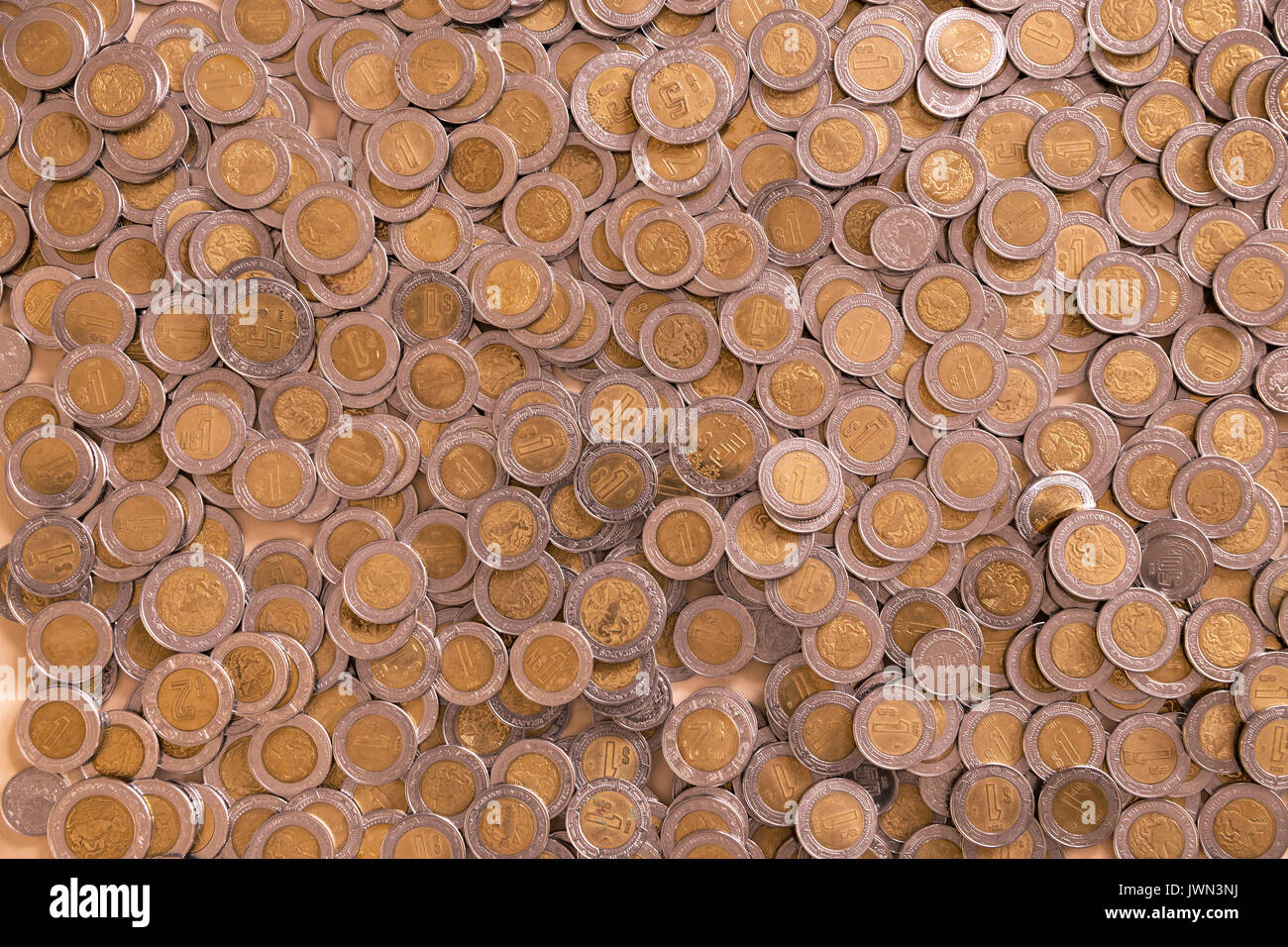 Un sacco di pesos messicani lo sfondo delle monete Foto Stock